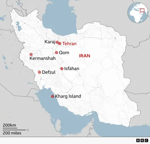 A map shows places in Iran that have been struck, including Karaj, Qom and Defzul.