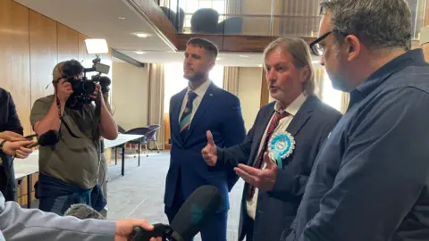 Reform UK councillors speaking to the media last week