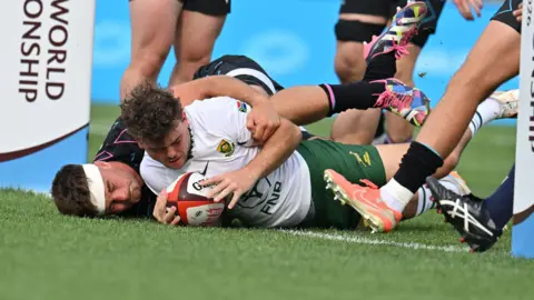 Hendre Schoeman dots the ball down to score for South Africa Under-20s against Wales at the Junior World Championship