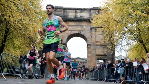 AJ Bell Great Scottish Run  man running the Great Scottish run