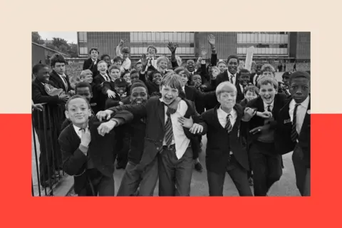 Getty Images A group of boys run towards the camera, on a playground