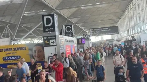 Supplied Queues at London Stansted Check-in area