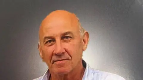 Reform UK Tony Love, appearing balding and in a shirt