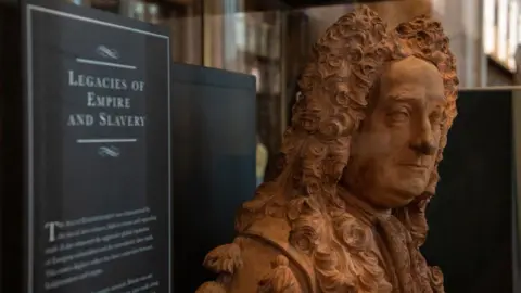 Getty Images A bust of British Museum founder, Sir Hans Sloane, sits in a new cabinet explaining his links to slavery at the British Museum