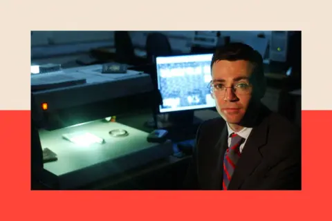 PA Andy Burnham sits in front of a video spectaral comparator machine
