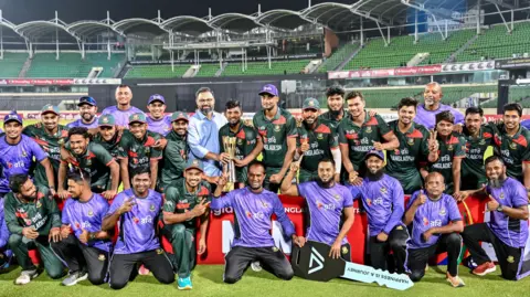 Bangladesh with the ODI series trophy