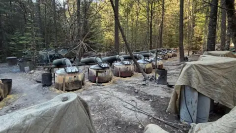 A suspected clandestine methamphetamine processing lab, according to the Attorney General's Office of Chihuahua, discovered during an operation by Mexican authorities in a mountainous area near Guachochi, in Chihuahua state, Mexico, in this handout photo distributed on April 18, 2026. 