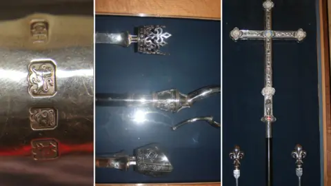 Sherborne Abbey Solid silver items taken in the raid including cross and crook in display cabinets