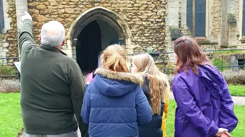 Val Spriggs Children outside Wisbech parish church