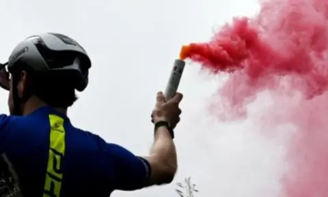 Giro d'Italia fan with flare 