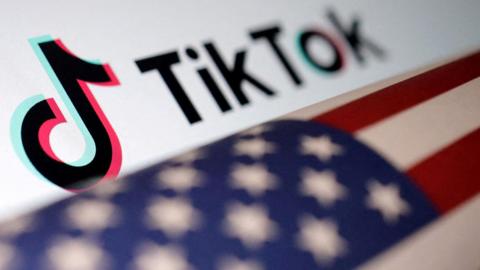Illustration of US flag placed on a TikTok logo.