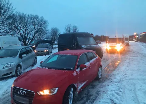 Thomas Hamilton via PA Queue of cars on the A303 between Ilminster, Somerset and Mere