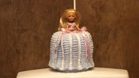 Alamy A toilet roll doll