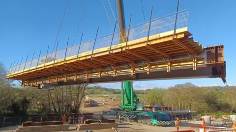 A bridge is lowered into place