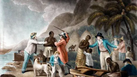 Oil painting that shows African slaves being transported by white Englishmen. In the background there are palm trees and mountains in the distance. The ocean and ships can be visibly seen in the left corner. 