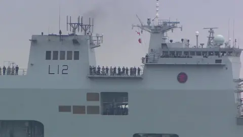 Navy crew on decks of HMS Ocean