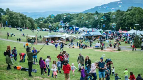 Ciara McMullan Attendees blow bubbles and play at the festival