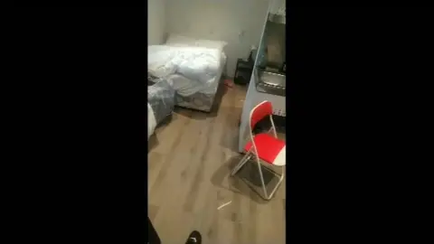 BBC Mobile phone footage of accommodation