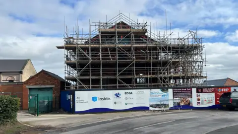 Building covered in scaffolding 