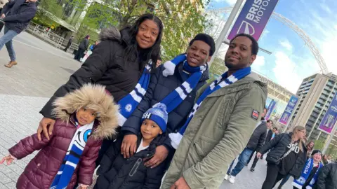 Danny Fullbrook/BBC Tray Blake and family