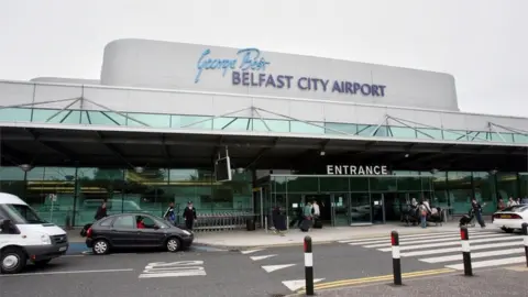 PA Media Exterior image of the George Best Belfast City Airport terminal building.