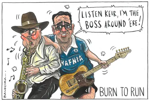 Graeme Bandeira/Northern Agenda A cartoon showing Keir Starmer resembling Bruce Springsteen playing a saxaphone with Andy Burnham dressed in a football shirt holding a guitar saying 'listen Keir, I'm the boss around 'ere!' It has the caption Burn to Run