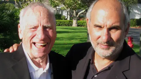 Alan Yentob alongside a smiling Mel Brooks, pictured in 2011