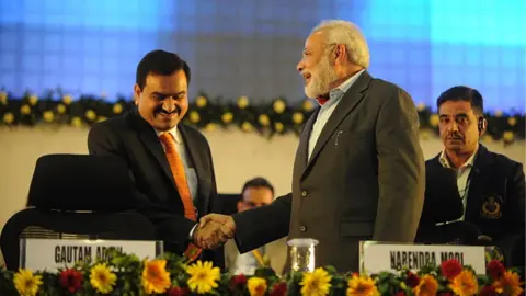 Google : Gujarat Chief Minister Narendra Modi and Chairman Of Adani Group Gautam Adani at 5th Vibrant Gujarat Global Summit on January 13, 2011 in Gandhinagar, India.