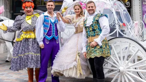 Clara Lou Photography Cast of Cinderella outside Regent Theatre, Stoke-on-Trent