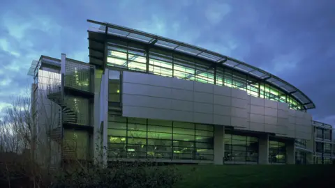 The glass and steel facade of the award winning Centenary Building in Salford University  