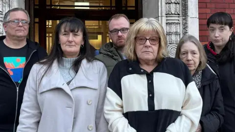 The families of Winifred Tubb, Raymond Thomas and Leonard Allen read a statement outside Cheshire Coroner's court.