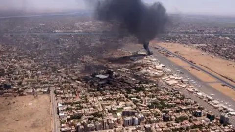 AFP Smoke rising over the airport