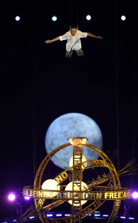 PA Media The late British dancer and actor David Toole performing at the Paralympics opening ceremony