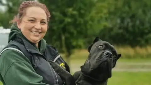 Emma Woodruff Emma Woodruff with a dog