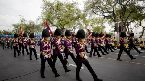 EPA Thai Royal guards march during the coronation of Thai King Maha Vajiralongkorn Bodindradebayavarangkun outside the Grand Palace