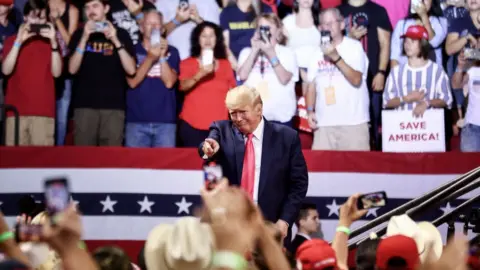 Getty Images Donald Trump on stage