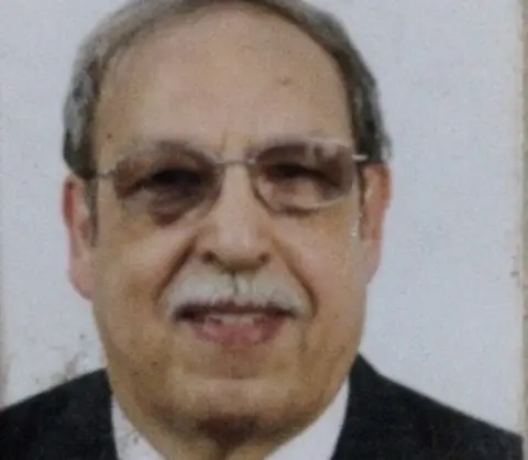 Beitelmal family Passport picture of father