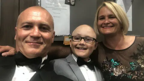 Family photo Jason, Olly and Jill McKenna