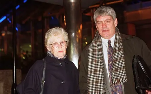 PA Media Alastair Morgan and his mother Isobel Hulsmann arriving at Scotland Yard for a meeting with Metropolitan police commissioner Sir Paul Condon, 7 November 1997