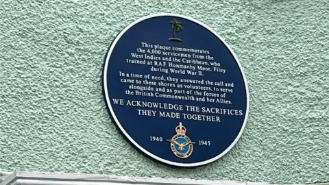 Abi Jaiyeola/BBC The plaque