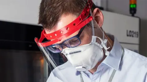 BAE Systems Image showing 3D printed face shield being worn