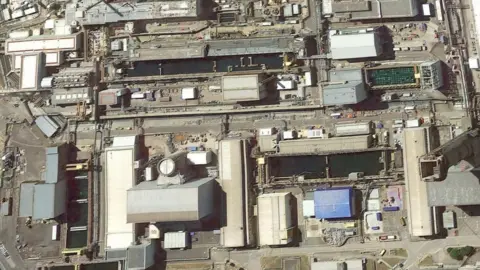 Google Aerial view of large pools among buildings on Sellafield site