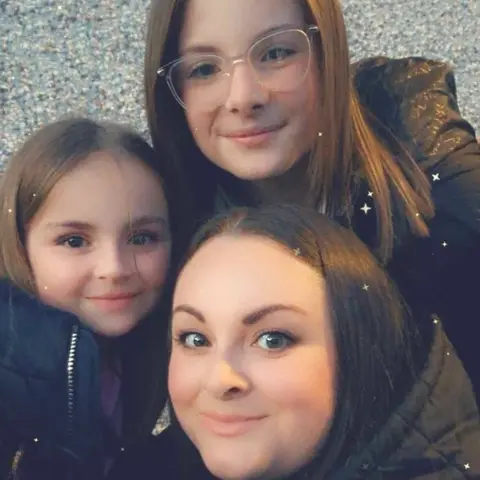 Jess Hanshaw Jess with two of her children