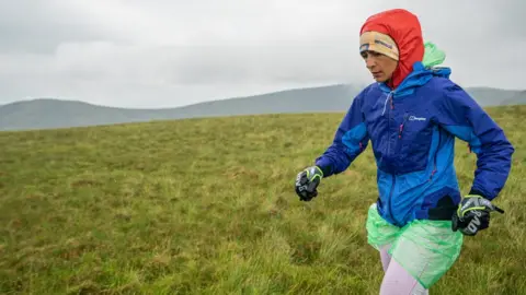 Steve Ashworth Sabrina Verjee undertaking the Wainwrights challenge in 2020