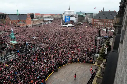 Shutterstock Tens of thousands watched the succession outside Christiansborg Castle in Copenhagen