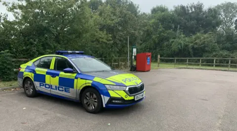 Police car parked at Franklin Park