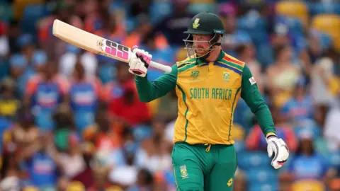 South Africa's Heinrich Klaasen raising his bat for a half-century 