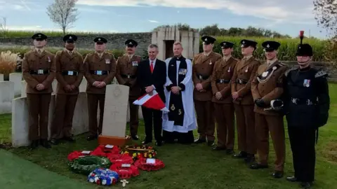 Ministry of Defence Bob Adams, the first cousin twice removed of Rifleman Adams, with the party from 3rd Battalion The Rifles.