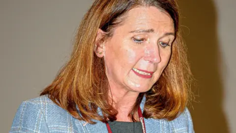 Getty Images Chief Executive of Clacks Council, Nikki Bridle speaking during the opening ceremony. 