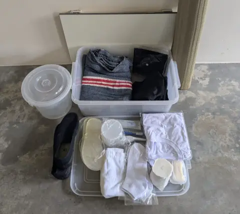 Singapore Prison Service Inmates are given items including a T-shirt and socks, and a rush mat on which to sleep